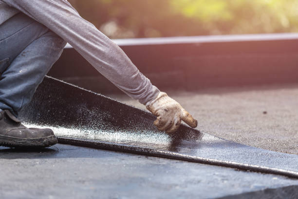 Professional Waterproofing technician working in Akron, OH